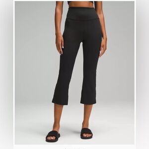 Lululemon. Groove Super High Rise. 23”. Size 4. Black. New with tags. Grey